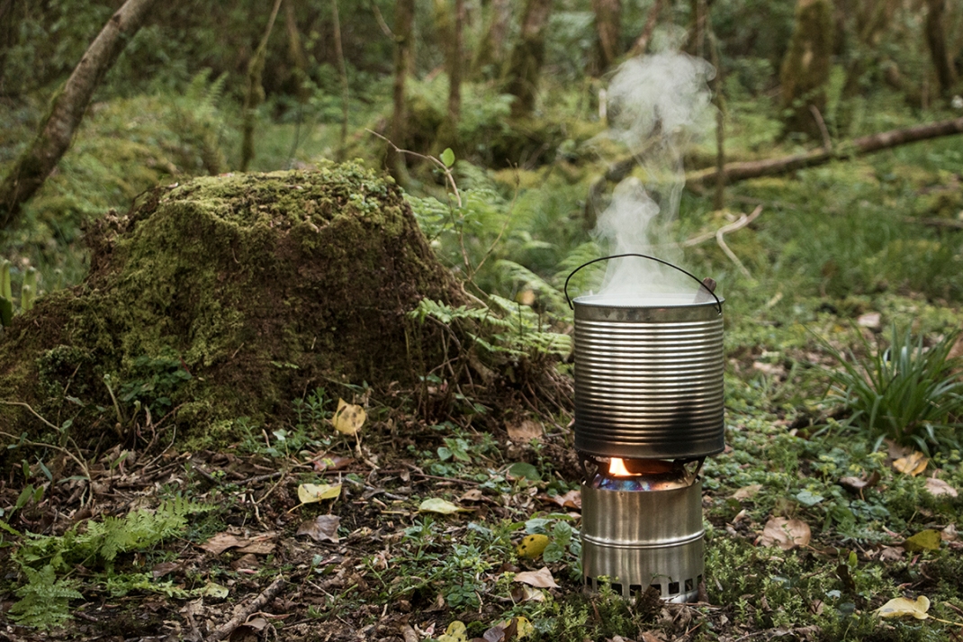 Nettle gruel cooked on a wood stove in the woods | Wild cooking with Crank and Cog.