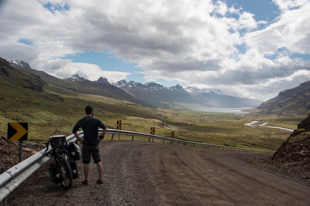 Ciaran admiring the Icelandic countryside on top of the Oxi Mountains, Iceland | Crank and Cog cycle tour of Iceland.