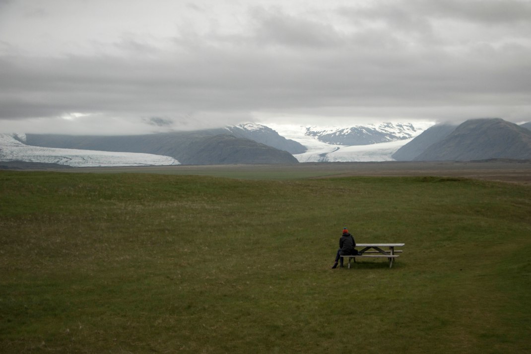 Sitting on a bench in Iceland | Crank & Cog cycle tour of Iceland.