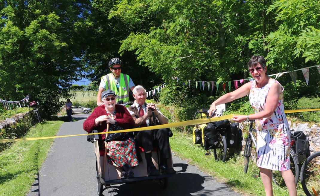 Trishaw cutting ribbon copy